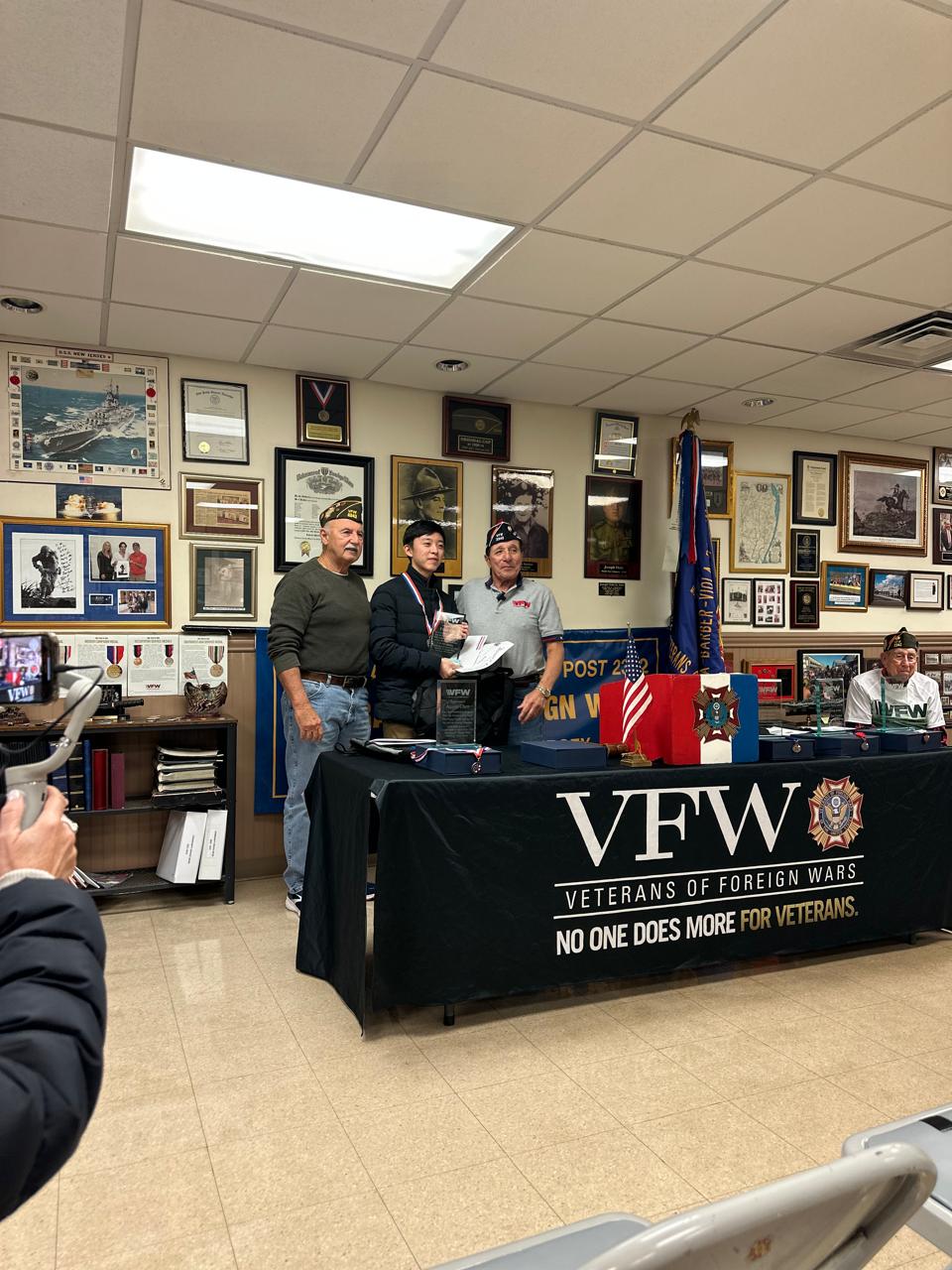 Ethan Cha presenting a civic engagement app during competition judging
